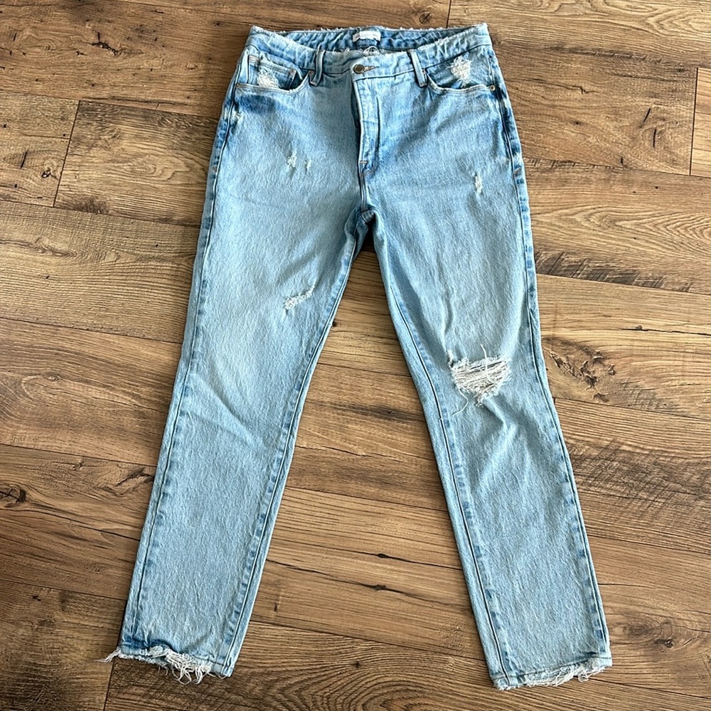 Good American distressed relaxed cross-waisted jeans